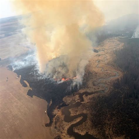 Firefighters question Alberta cuts to aerial attack teams as province battles blazes